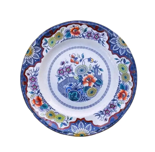 Foto de um(a) Antigo Raro Prato Decorativo Em Porcelana Holandesa Floral, da categoria de Pratos Decorativos. Antigo prato decorativo em porcelana artística holandesa. Lindas cores e decoração floral. Diâmetro 24cm. Vendido no marketplace Trésors.