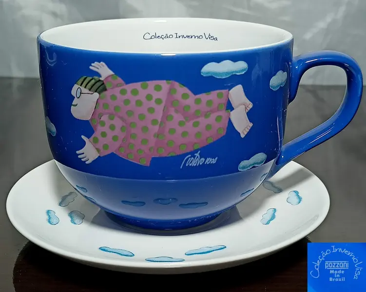 Foto de um(a) GUSTAVO ROSA, Sonhador, Coleção Inverno Visa, da categoria de Canecas. GUSTAVO ROSA, Sonhador, Coleção Inverno Visa, Xícara e pires de porcelana, xícara com 10cm de diâmetro e 8cm de altura,... Mostrado de uma perspectiva diferente. Vendido no marketplace Trésors.