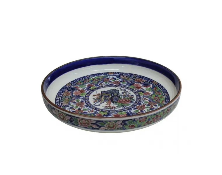 Foto de um(a) Centro de mesa em cerâmica vitrificada, da categoria de Centro de mesa. Exuberante centro de mesa em cerâmica vitrificada, pintada à mão com motivos florais em policromia, barrado externo de... Vendido no marketplace Trésors.