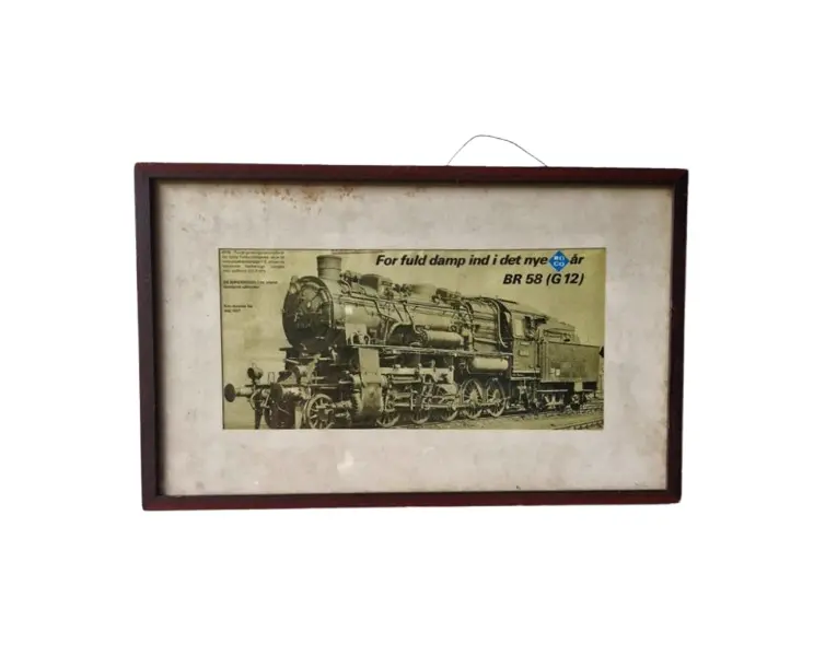 Foto de um(a) Belo quadro vintage de locomotiva à vapor, da categoria de Cartazes. Belo quadro vintage representando um anúncio de 1977 de uma locomotiva à vapor alemã, que foi desenvolvida para as ferrovias... Vendido no marketplace Trésors.