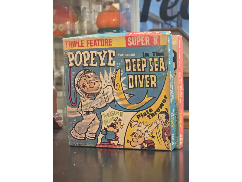 Foto de um(a) Filme Super 8 Popeye Deep Sea Diver, da categoria de Projetores. Filmes Super 8 americanos, originais de época, destinados a projeção e coleção. Peças que representam um importante capítulo... Mostrado de uma perspectiva diferente. Vendido no marketplace Trésors.