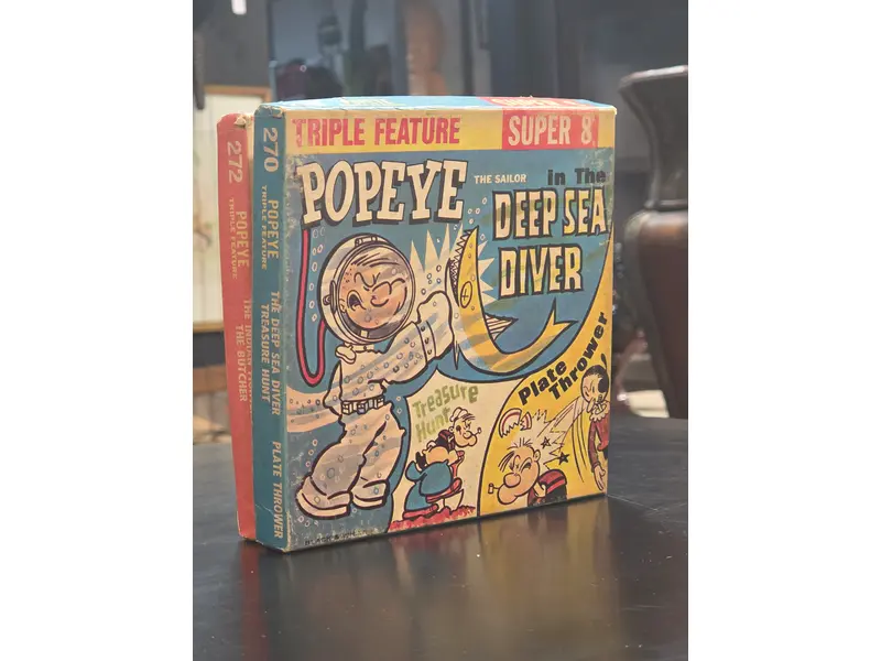 Foto de um(a) Filme Super 8 Popeye Deep Sea Diver, da categoria de Projetores. Filmes Super 8 americanos, originais de época, destinados a projeção e coleção. Peças que representam um importante capítulo... Mostrado de uma perspectiva diferente. Vendido no marketplace Trésors.