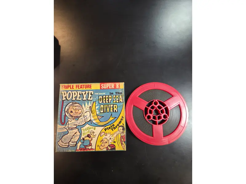 Foto de um(a) Filme Super 8 Popeye Deep Sea Diver, da categoria de Projetores. Filmes Super 8 americanos, originais de época, destinados a projeção e coleção. Peças que representam um importante capítulo... Mostrado de uma perspectiva diferente. Vendido no marketplace Trésors.