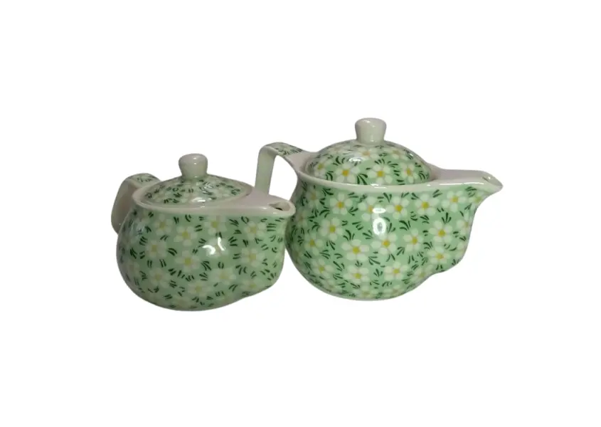 Foto de um(a) Mini Bules, da categoria de Bules. Mini bule e chaleira (+ peneira) em porcelana policromada. Dimensões: A bule menor 8cm / Diâmetro 9cm / Peso: 280g A bule... Vendido no marketplace Trésors.